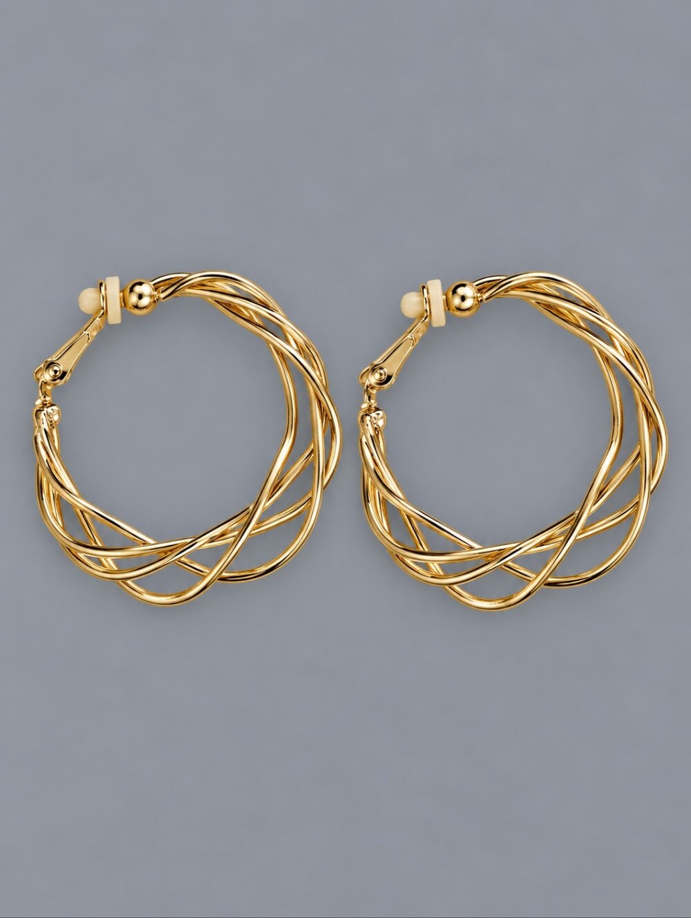 3/$30 Goldtone Twisted Hoop Clip-on Earrings